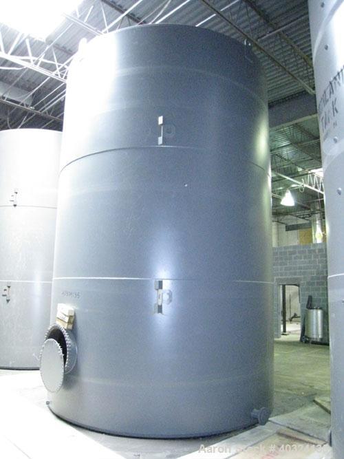 Unused- Highland Tank, 15,225 gallon, carbon steel, vertical. Approximately 12' diameter x 18' straight side, slight coned top, flat bottom. U.L. 142 labeled for above ground flammable storage. Openi...