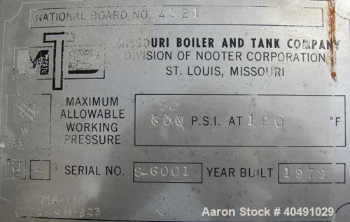 Used Missouri Boiler pressure tank, 85 gallon, carbon steel, vertical. Approximately 20" diameter x 60" straight side. 2 to 1 elliptical top and bottom. Internal rated 600 psi at 120 deg F. Openings:...