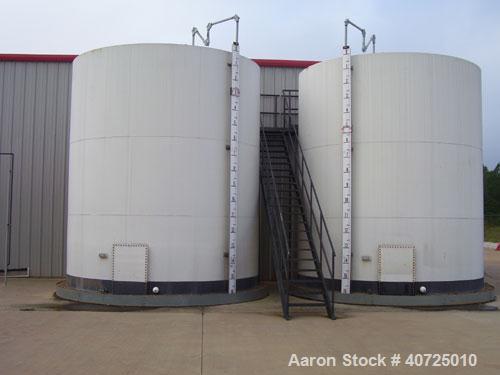 Used-Vertical tank, carbon steel, API STD 12-F. Nominal diameter 14' bottom, nominal height 16'. Shell 5/16. Epoxy lined, st...