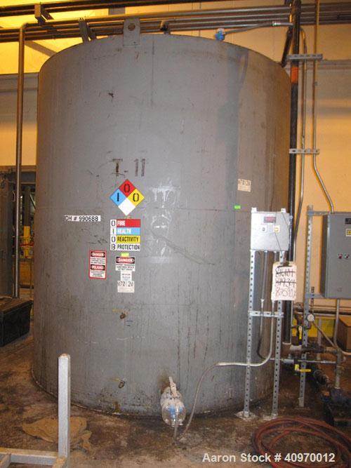 Used Tank, 7,500 Gallon, Carbon Steel. Flat top and bottom.  11' diameter x 11' straight side.  3" side bottom outlet.