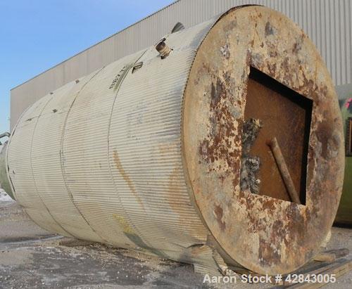 Used Tank, Carbon Steel, 9,500 Gallon, Vertical. Approximately 120" diameter x 192" straight side. Slight coned top and bottom. Openings top 8", Side bottom opening, 3-1/2" tangential center bottom o...