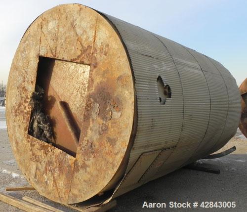 Used Tank, Carbon Steel, 9,500 Gallon, Vertical. Approximately 120" diameter x 192" straight side. Slight coned top and bottom. Openings top 8", Side bottom opening, 3-1/2" tangential center bottom o...