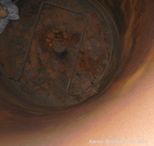 Used Tank, Carbon Steel, 9,500 Gallon, Vertical. Approximately 120" diameter x 192" straight side. Slight coned top and bottom. Openings top 8", Side bottom opening, 3-1/2" tangential center bottom o...