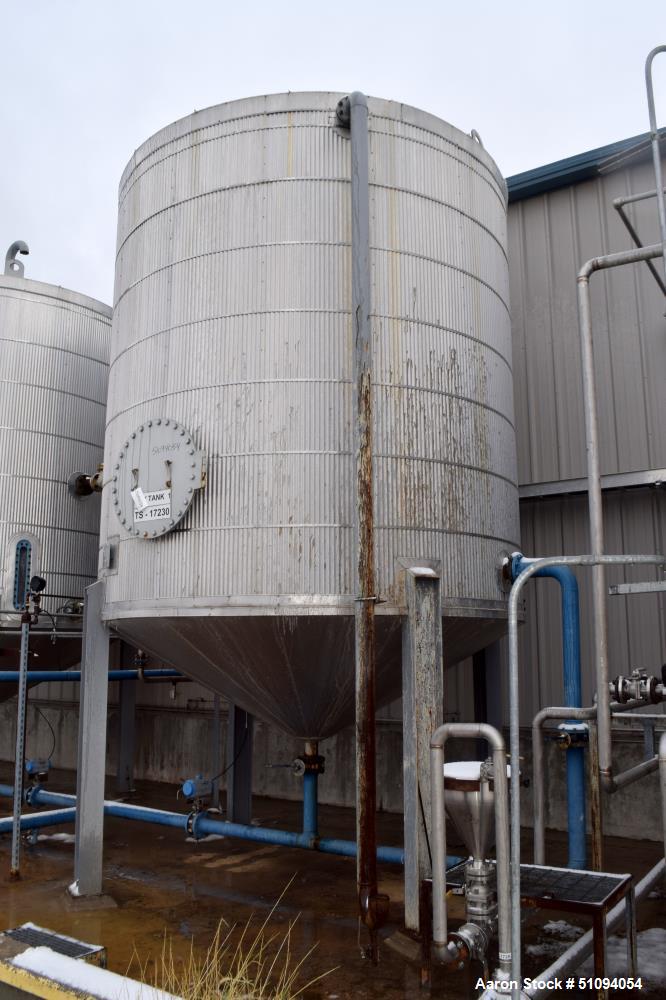 Used Par Piping & Fabrication Tank, 8500 Gallon, A36 Carbon Steel, Vertical. Approximate 132" diameter x 144" straight side, coned top & bottom. Internal rated -20 to 350 degrees F. Approximate 4" ce...
