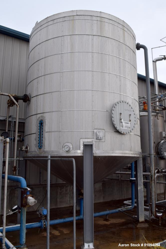 Used Par Piping & Fabrication Tank, 8500 Gallon, A36 Carbon Steel, Vertical. Approximate 132" diameter x 144" straight side, coned top & bottom. Internal rated -20 to 350 degrees F. Approximate 4" ce...