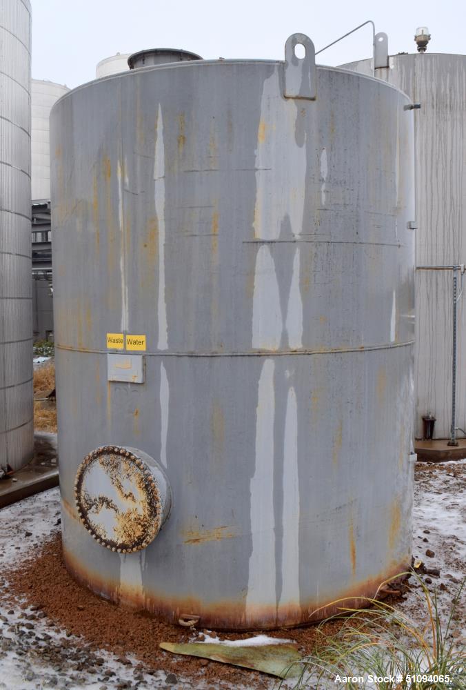 Used Squibb Tank Company Aboveground Flammable Liquid Tank, 7050 Gallon, A36 Carbon Steel, Vertical. Approximate 120" diameter x 144" straight side, cone top, flat bottom. Design temperature to 350 d...