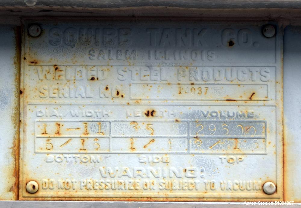Used Squibb Tank Company Aboveground Flammable Liquid Tank, 29,600 Gallon, A36 Carbon Steel, Vertical. Approximate 143" diameter x 420" straight side, cone top, flat bottom. Design temperature to 350...