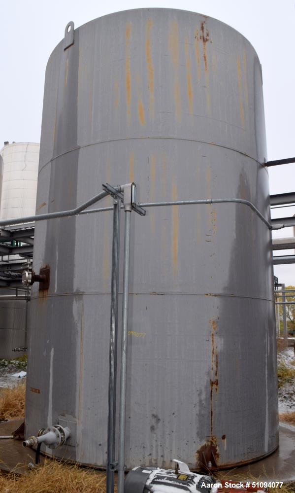 Used Squibb Tank Company Aboveground Flammable Liquid Tank, 15,000 Gallon, A36 Carbon Steel, Vertical. Approximate 143" diameter x 216" straight side, cone top, flat bottom. Openings top 4", 18" man ...