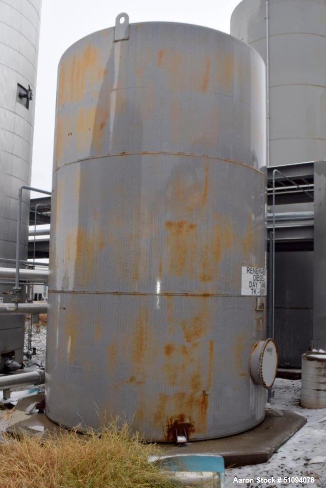 Used Squibb Tank Company Aboveground Flammable Liquid Tank, 15,000 Gallon, A36 Carbon Steel, Vertical. Approximate 143" diameter x 216" straight side, cone top, flat bottom. Openings top 4", 18" man ...