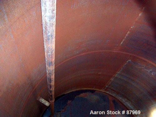 USED: Tank, 10,300 gallon, carbon steel, vertical. 10'6" diameter x 16' straight side. Slight coned top, flat bottom. Side bottom Lightnin agitator, model SG200,1 1/2" diameter x 18" long carbon stee...