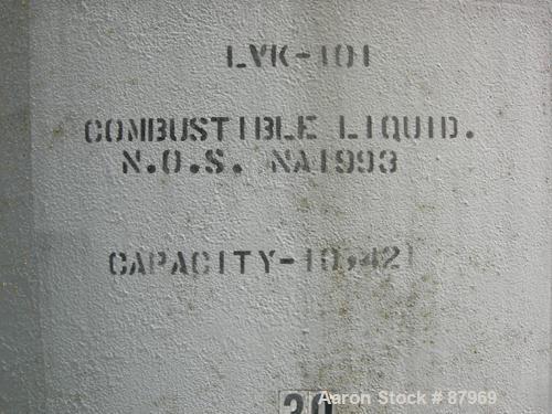 USED: Tank, 10,300 gallon, carbon steel, vertical. 10'6" diameter x 16' straight side. Slight coned top, flat bottom. Side bottom Lightnin agitator, model SG200,1 1/2" diameter x 18" long carbon stee...