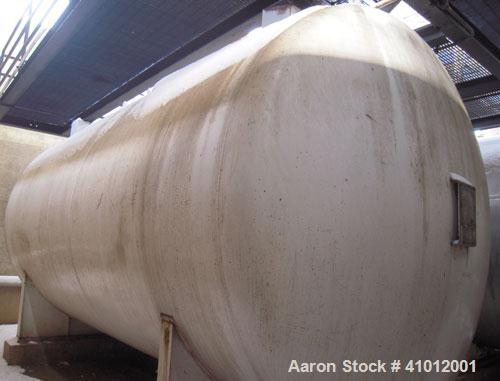 Used Clawson Pressure Tank, 13,504 Gallon, Carbon Steel, Horizontal. Approximate 125.5" diameter x 222" straight side, dished heads.  Vessel rated 20 psi @ 100 degrees F.  Openings: Top 30" manway wi...