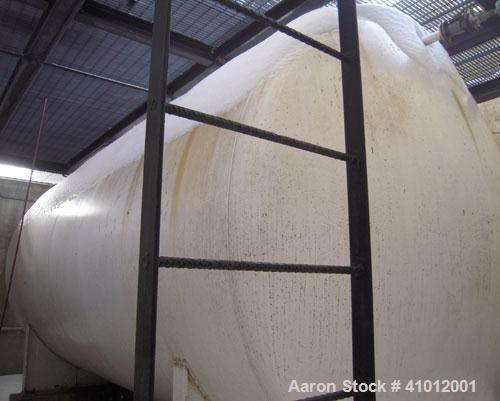 Used Clawson Pressure Tank, 13,504 Gallon, Carbon Steel, Horizontal. Approximate 125.5" diameter x 222" straight side, dished heads.  Vessel rated 20 psi @ 100 degrees F.  Openings: Top 30" manway wi...