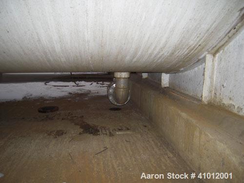 Used Clawson Pressure Tank, 13,504 Gallon, Carbon Steel, Horizontal. Approximate 125.5" diameter x 222" straight side, dished heads.  Vessel rated 20 psi @ 100 degrees F.  Openings: Top 30" manway wi...