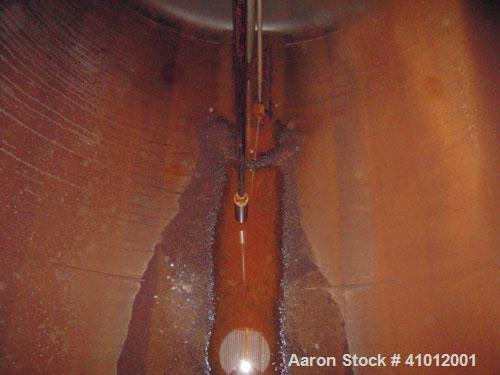 Used Clawson Pressure Tank, 13,504 Gallon, Carbon Steel, Horizontal. Approximate 125.5" diameter x 222" straight side, dished heads.  Vessel rated 20 psi @ 100 degrees F.  Openings: Top 30" manway wi...