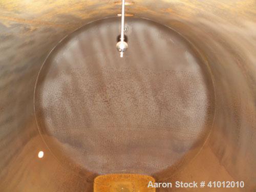 Used Clawson Pressure Tank, 6,708 Gallon, Carbon Steel, Horizontal. 95-1/2" Diameter x 192" straight side, dished heads. Internal rated 20 psi at -20 to 100 degrees F. Openings top 30" man way with c...