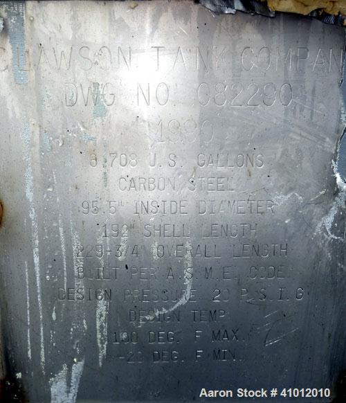 Used Clawson Pressure Tank, 6,708 Gallon, Carbon Steel, Horizontal. 95-1/2" Diameter x 192" straight side, dished heads. Internal rated 20 psi at -20 to 100 degrees F. Openings top 30" man way with c...
