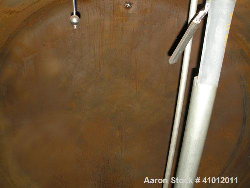 Used Clawson Tank Company 2 Compartment Pressure Tank, 12,336 gallons, 6,168 gallons per compartment, carbon steel, horizontal. Each compartment 125-1/2" diameter x 111" straight side, dished heads. ...