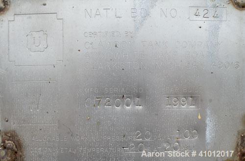 Used Clawson Pressure Tank, 13,504 gallons, SA-516-070 carbon steel, horizontal. 125-1/2" diameter x 222" straight side, dished heads. Internal rated 20 psi at 100 deg F, and -20 deg F at 20 psi. Ope...