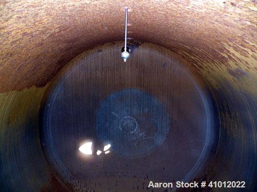 Used Clawson Pressure Tank, 13,504 gallons, SA-516-070 carbon steel, horizontal. 125-1/2" diameter x 222" straight side, dished heads. Internal rated 20 psi at 100 deg F, and -20 deg F at 20 psi. Ope...