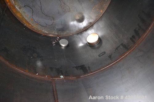 Used Clawson Tank Company Aboveground Flammable Liquid Storage Tank, 7500 Gallon, Carbon Steel. 126’’ Diameter x 144’’ straight side, coned top, flat bottom. UL rated, UL# 892398. Openings top (2) 3-...