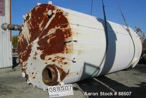USED: Clawson tank, 15,000 gallon, carbon steel, vertical. 10'6" diameter x 24' straight side. Cone top, flat bottom. Internal rated atmos at 70 deg F. Openings: top 2-1/2", (2) 3", (3) 4", 20"; side...