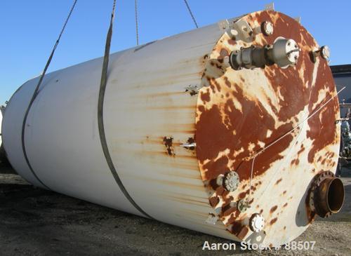 USED: Clawson tank, 15,000 gallon, carbon steel, vertical. 10'6" diameter x 24' straight side. Cone top, flat bottom. Internal rated atmos at 70 deg F. Openings: top 2-1/2", (2) 3", (3) 4", 20"; side...