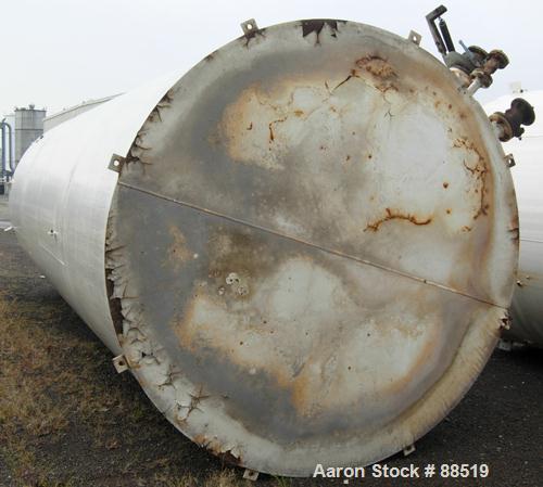 USED: Clawson tank, 9,000 gallon, carbon steel. Approximately 8' diameter x 24' straight side. Flat top and bottom. 24" side bottom manway. Top openings: (1) 2" flange, (2) 3" flange, (3) 4" flange, ...