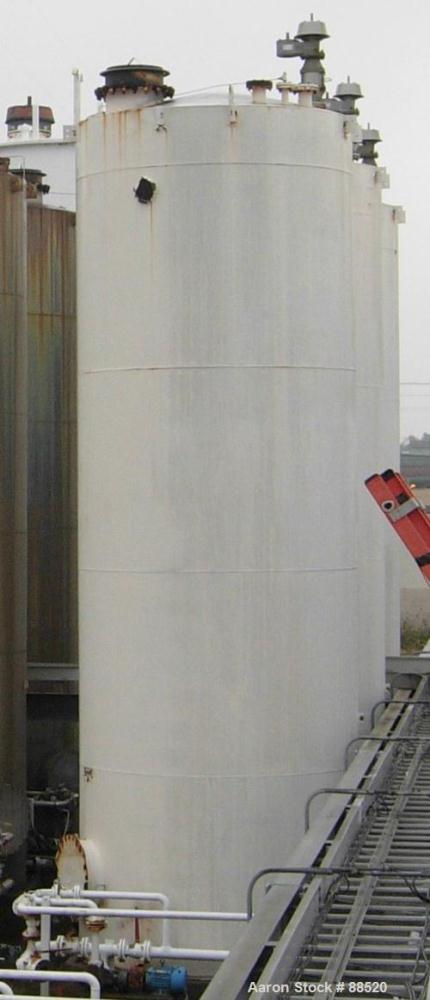 USED: Clawson tank, 9,000 gallon, carbon steel. Approximately 8' diameter x 24' straight side. Flat top and bottom. 24" side bottom manway.