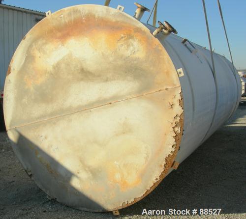 USED: Clawson tank, 9,000 gallon, carbon steel. Approximately 8' diameter x 24' straight side. Slight coned top, flat bottom. Internal rated atmos at 70 deg F. Openings: top 2", (2) 3", (3) 4", 20"; ...