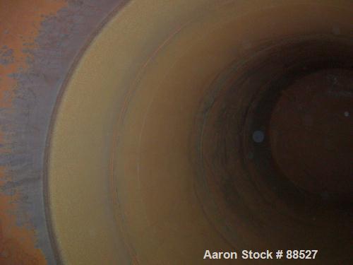 USED: Clawson tank, 9,000 gallon, carbon steel. Approximately 8' diameter x 24' straight side. Slight coned top, flat bottom. Internal rated atmos at 70 deg F. Openings: top 2", (2) 3", (3) 4", 20"; ...
