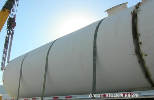 USED: Clawson tank, 9,000 gallon, carbon steel. Approximately 8' diameter x 24' straight side. Slight coned top, flat bottom. Internal rated atmos at 70 deg F. Openings: top 2", (2) 3", (3) 4", 20"; ...