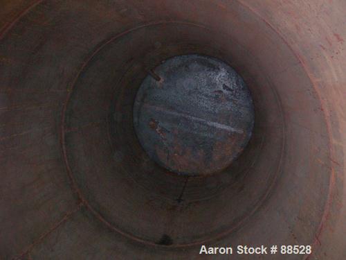 USED: Clawson tank, 9,000 gallon, carbon steel. Approximately 8' diameter x 24' straight side. Slight coned top, flat bottom. Internal rated atmos at 70 deg F. Openings: top 2", (2) 3", (3) 4", 20"; ...