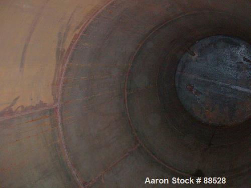 USED: Clawson tank, 9,000 gallon, carbon steel. Approximately 8' diameter x 24' straight side. Slight coned top, flat bottom. Internal rated atmos at 70 deg F. Openings: top 2", (2) 3", (3) 4", 20"; ...