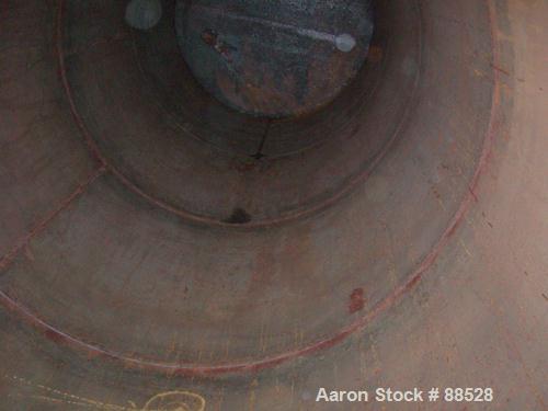 USED: Clawson tank, 9,000 gallon, carbon steel. Approximately 8' diameter x 24' straight side. Slight coned top, flat bottom...