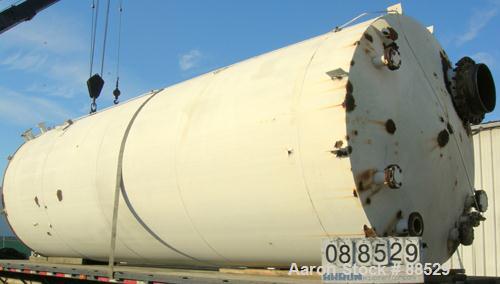 USED: Clawson tank, 9,000 gallon, carbon steel. Approximately 8' diameter x 24' straight side. Slight coned top, flat bottom. Internal rated atmos at 70 deg F. Openings: top 2", (2) 3", (3) 4", 20"; ...