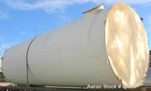 USED: Clawson tank, 9,000 gallon, carbon steel. Approximately 8' diameter x 24' straight side. Slight coned top, flat bottom. Internal rated atmos at 70 deg F. Openings: top 2", (2) 3", (3) 4", 20"; ...