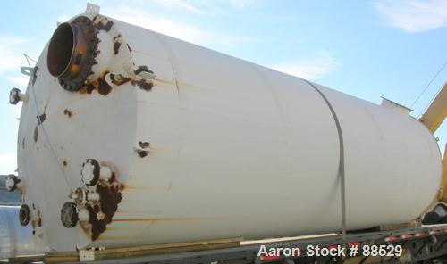 USED: Clawson tank, 9,000 gallon, carbon steel. Approximately 8' diameter x 24' straight side. Slight coned top, flat bottom. Internal rated atmos at 70 deg F. Openings: top 2", (2) 3", (3) 4", 20"; ...