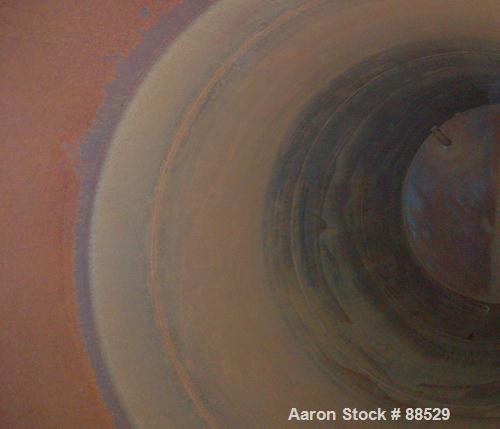 USED: Clawson tank, 9,000 gallon, carbon steel. Approximately 8' diameter x 24' straight side. Slight coned top, flat bottom. Internal rated atmos at 70 deg F. Openings: top 2", (2) 3", (3) 4", 20"; ...