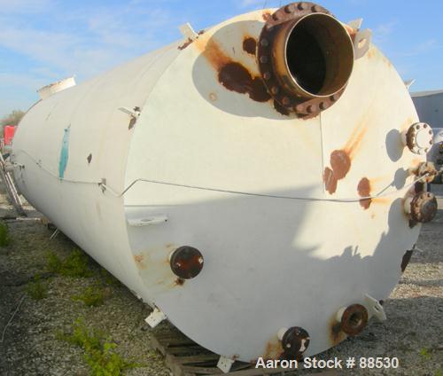 USED: Clawson tank, 9,000 gallon, carbon steel. Approximately 8' diameter x 24' straight side. Slight coned top, flat bottom. Internal rated atmos at 70 deg F. Openings: top 2", (2) 3", (3) 4", 20"; ...