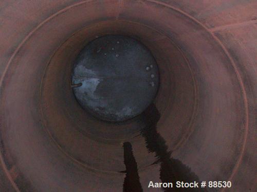 USED: Clawson tank, 9,000 gallon, carbon steel. Approximately 8' diameter x 24' straight side. Slight coned top, flat bottom. Internal rated atmos at 70 deg F. Openings: top 2", (2) 3", (3) 4", 20"; ...