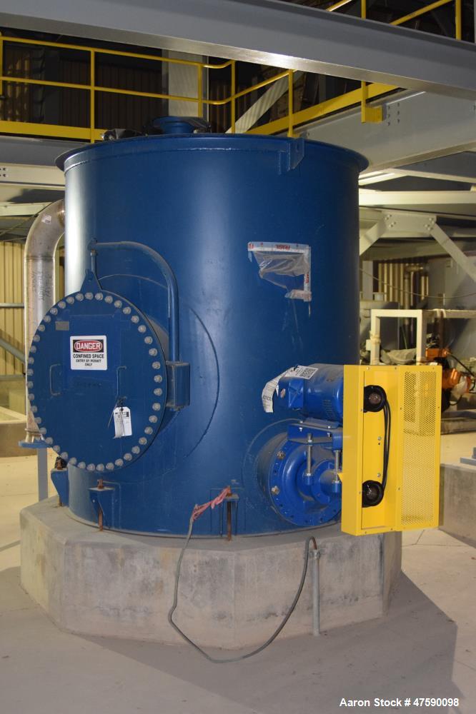 Unused- Delkor Filtrate Tank, Approximate 1300 Gallon, Carbon Steel, Vertical. Approximate 72" diameter x 76" straight side, flat top & bottom. Includes (2) Carver pumps, type KF55-0H 3X9 3/4-316, 31...