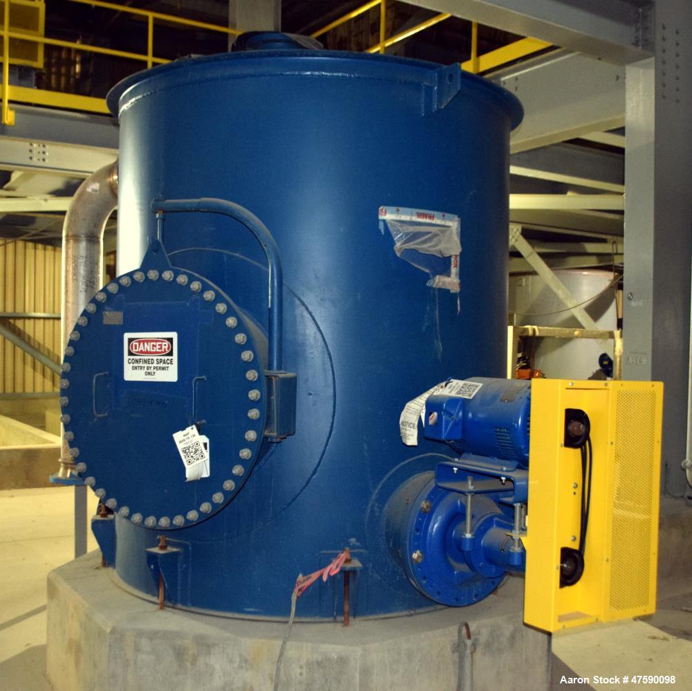 Unused- Delkor Filtrate Tank, Approximate 1300 Gallon, Carbon Steel, Vertical. Approximate 72" diameter x 76" straight side, flat top & bottom. Includes (2) Carver pumps, type KF55-0H 3X9 3/4-316, 31...