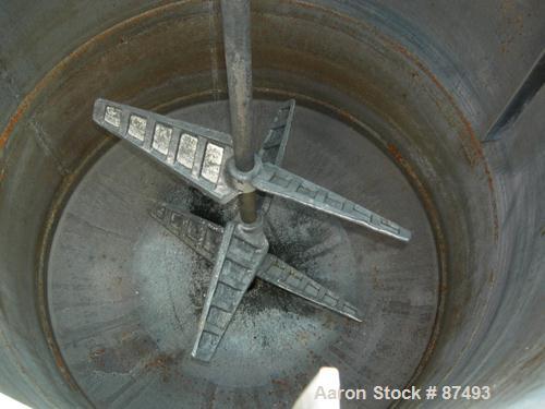 USED: Graco mix tank 125 gallons, carbon steel, vertical. 30" diameter x 40" straight side. Flat bolt on top with 1/3 hinged cover, dish bottom. Top mounted agitator, 1" diameter shaft with (2) 2 win...
