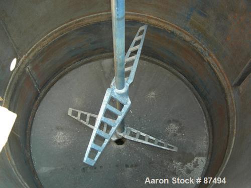 USED: Graco mix tank 125 gallons, carbon steel, vertical. 30" diameter x 40" straight side. Flat bolt on top with 1/3 hinged cover, dish bottom. Top mounted agitator, 1" diameter shaft with (2) 2 win...
