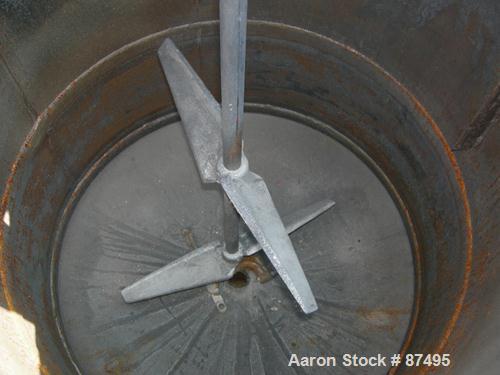USED: Graco Mix Tank 125 gallons, carbon steel, vertical. 30" diameter x 40" straight side. Flat bolt on top with 1/3 hinged cover, dish bottom. Top mounted agitator, 1" diameter shaft with (2) 2 win...