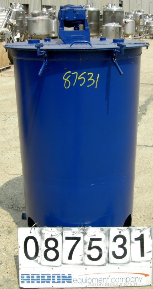 USED: Graco Mix Tank 125 gallons, carbon steel, vertical. 30" diameter x 40" straight side. Flat bolt on top with 1/3 hinged cover, dish bottom. Top mounted agitator, 1" diameter shaft with (2) 2 win...