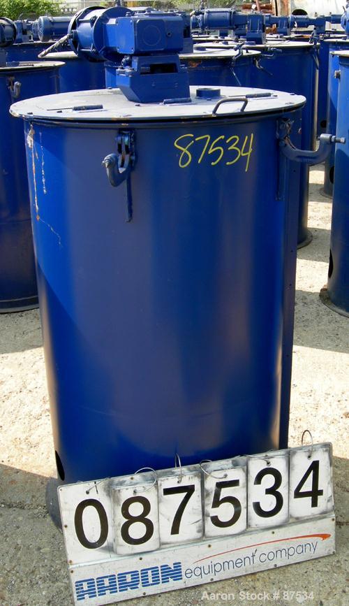 USED: Graco Mix Tank, 100 gallon, carbon steel, vertical. 30" diameter x 33" straight side. Flat bolt on top with 1/3 hinged cover, dish bottom. Top mounted agitator, 1" diameter shaft with (2) 2 win...
