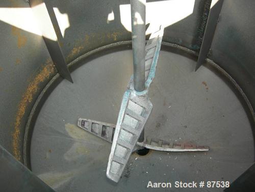 USED: Graco Mix Tank, 100 gallon, carbon steel, vertical. 30" diameter x 33" straight side. Flat bolt on top with 1/3 hinged cover, dish bottom. Top mounted agitator, 1" diameter shaft with (2) 2 win...