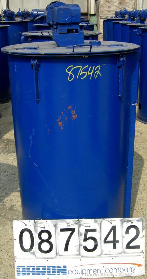 USED: Graco Mix Tank, 100 gallon, carbon steel, vertical. 30" diameter x 33" straight side. Flat bolt on top with 1/3 hinged cover, dish bottom. Top mounted agitator, 1" diameter shaft with (3) 2 win...